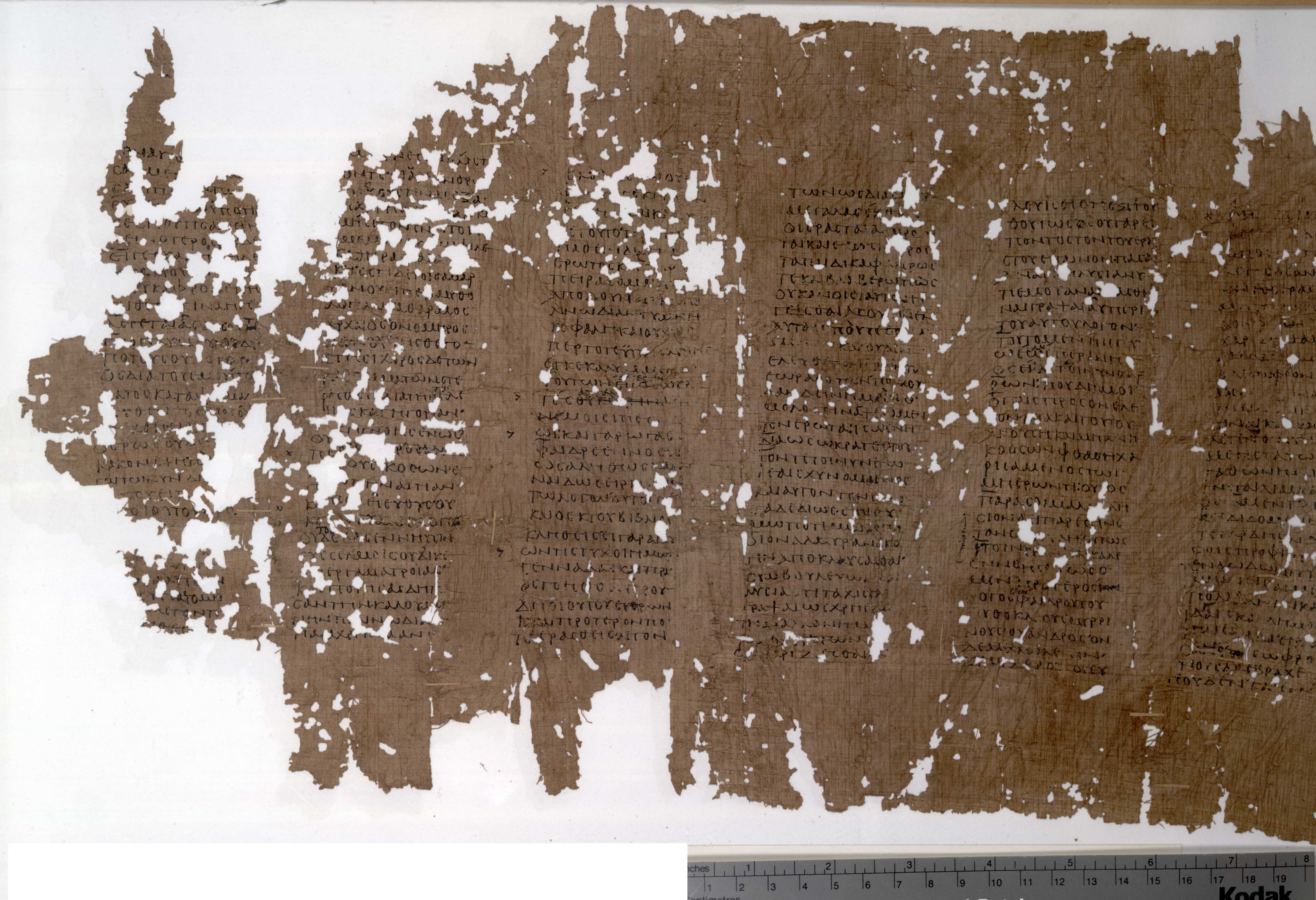 Papyrus Oxyrhynchus XVII 2102 (P.Oxy. XVII 2102), held at Oxford, is a Greek papyrus from Oxyrhynchus, Egypt, dating to the late second century AD — likely its second half — and one of three Oxyrhynchus witnesses to Plato's Phaedrus. This recto image shows nine consecutive columns (the last three very fragmentary) from a roll measuring 25.4 cm in height, written in a round, upright literary hand of medium size with short lines of approximately 5 cm set in columns 15 cm tall, slightly inclined to the right. A second hand is frequently in evidence, introducing corrections and variant readings from a different exemplar, inserting accents, breathings, marks of elision and quantity, and marginal signs; punctuation by high and medial dots, paragraphi, and colons marking changes of speaker is also largely secondary. A coronis at column v, line 21 marks the end of a section. The original scribe was careless and made numerous errors, most of which the corrector caught; despite this, the text is a reasonably good one, collated against Burnet's edition. It was discovered during the excavations of Bernard Grenfell and Arthur Hunt at Oxyrhynchus and published in volume XVII of The Oxyrhynchus Papyri.