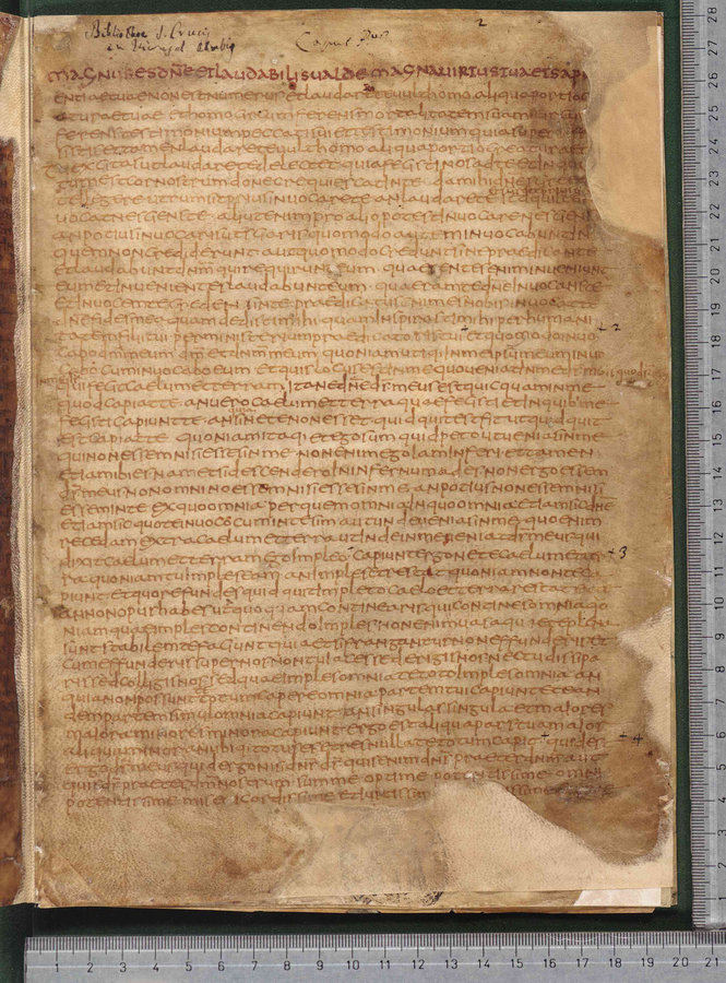 9th-century semi-uncial Latin manuscript page of Augustine's Confessions, the oldest known witness, with large display capitals and dense cursive text on aged parchment.